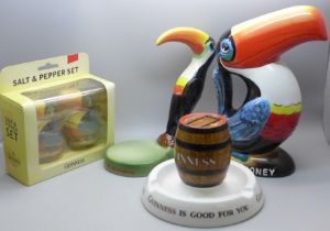 Guinness advertising items; a Carlton Ware Toucan figure, a Toucan Beer Money box, a Mintons