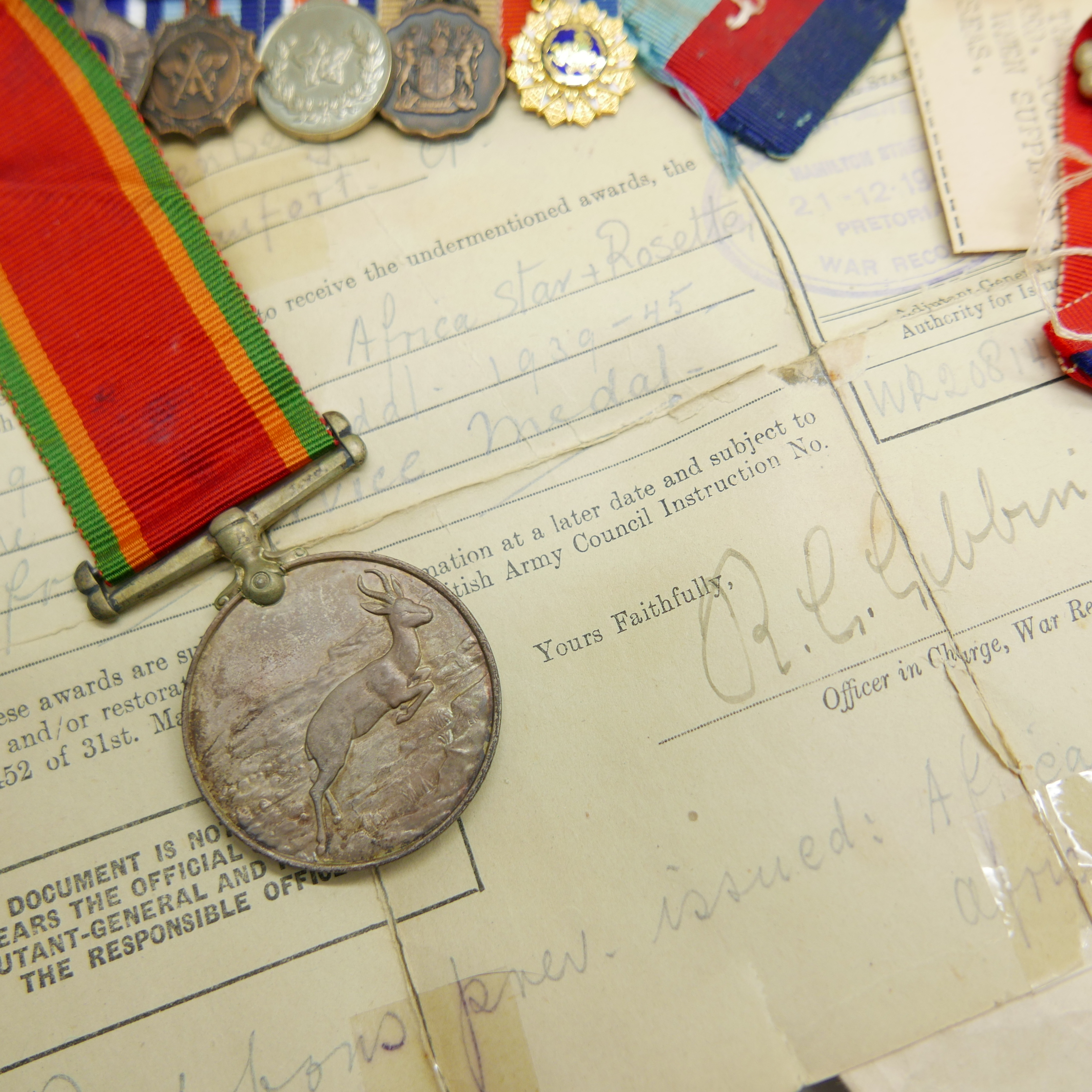 Assorted WWII medals, etc., including four to 21777 K.J. Hanssen with original address envelope - Image 4 of 11