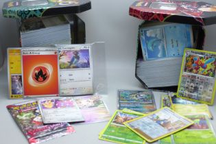 Over 700 Pokemon cards in tins, with holos (two tins)