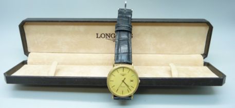 A gentleman's Longines quartz wristwatch on a leather strap, boxed