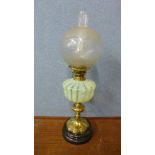 A Victorian brass oil lamp, with Vaseline glass reservoir