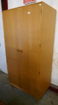 A Meredew teak wardrobe