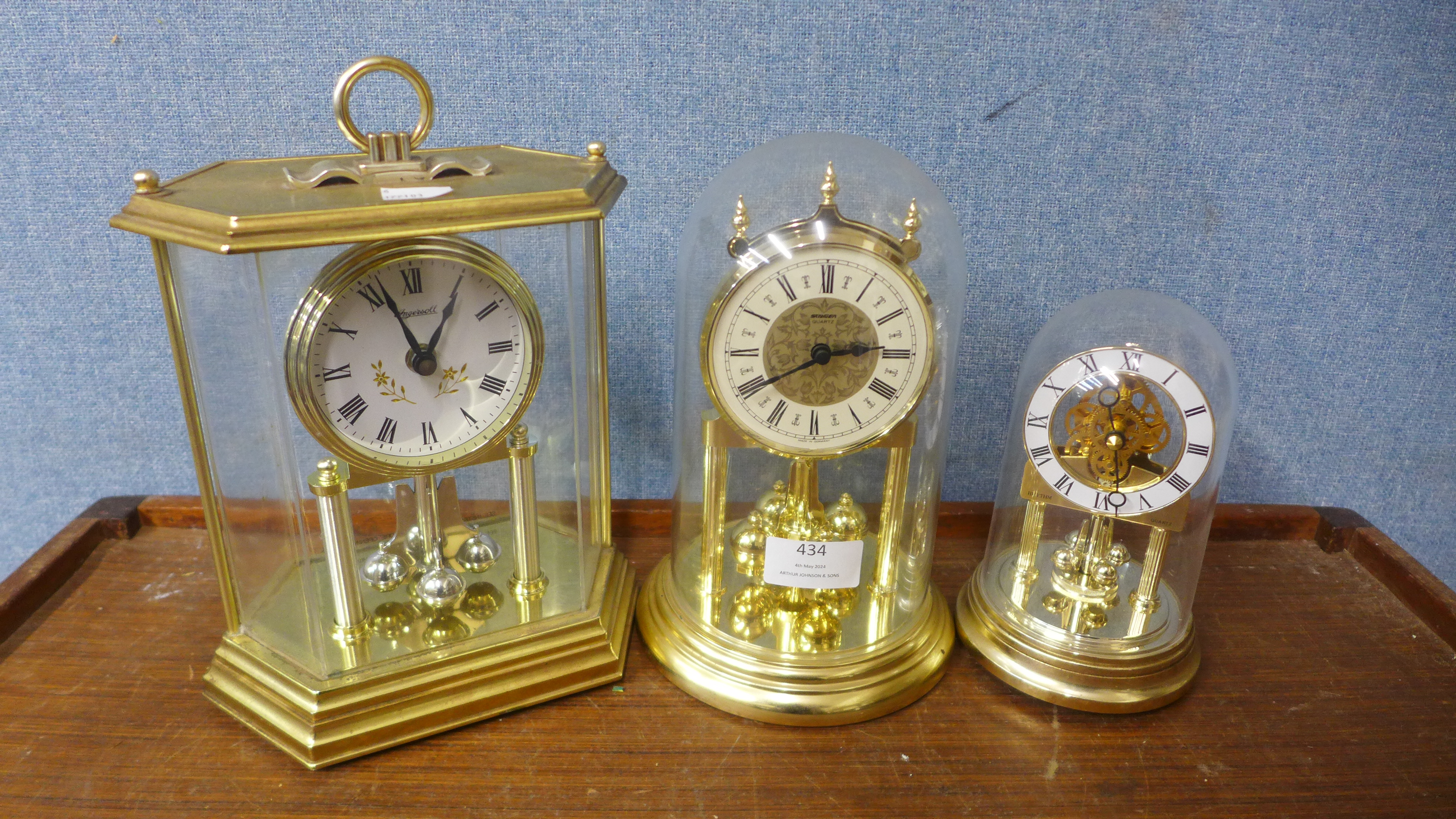 An Ingersoll anniversary clock and two others