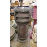 A Victorian terracotta chimney-pot