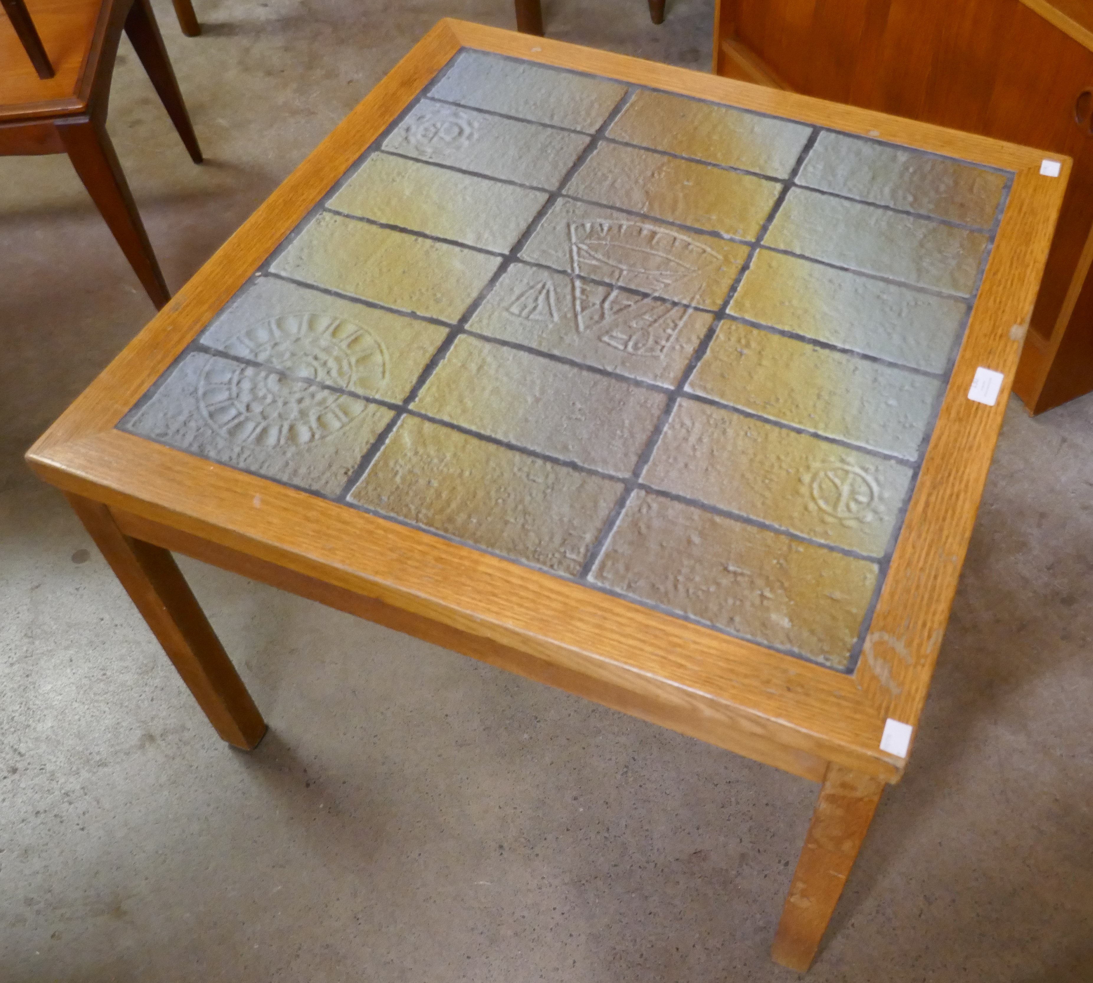 A Danish oak and tiled top coffee table