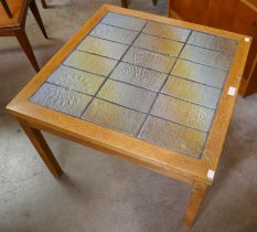 A Danish oak and tiled top coffee table