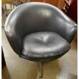 A black vinyl revolving cocktail lounge chair, on chrome base
