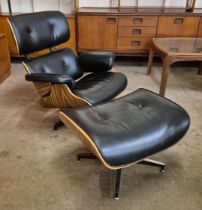 A Charles & Ray Eames style revolving lounge chair and ottoman