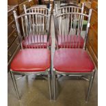 A set of four chrome dining chairs
