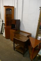 A teak corner cabinet, a telephone table, a corner table, bedside table and a trolley