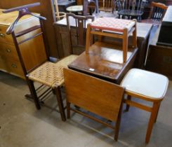 An oak drop-leaf trolley, a teak stool, a Weber mahogany vale stand, a teak folding table and two