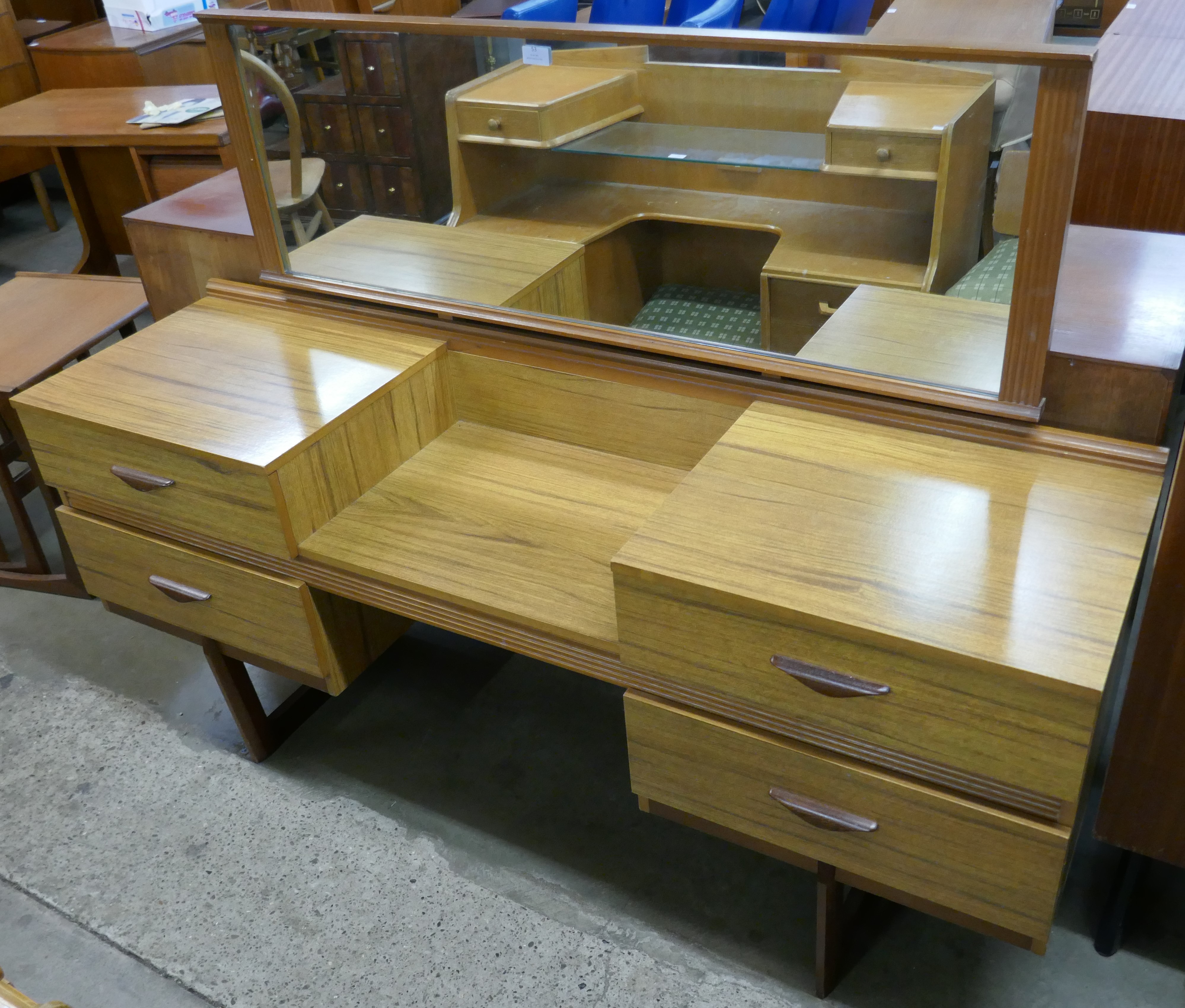 A teak dressing table