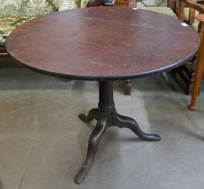 A George III circular oak tripod tea table
