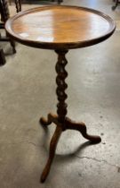 An early 20th Century oak barleytwist tripod wine table