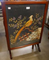 A mahogany folding table/fire screen, with embroided pheasant panel