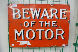 An enamelled Beware of the Motor sign