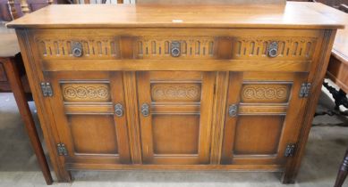 A carved oak sideboard
