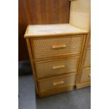 A small Italian style bamboo and rattan chest of drawers
