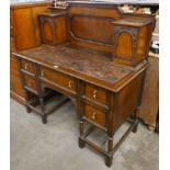 An oak Dickens style desk