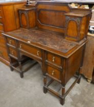 An oak Dickens style desk