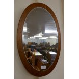 Two teak and tiled top nest of tables, a teak framed mirror and a lady's sewing box