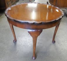 A Queen Anne style walnut coffee table