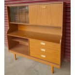 A simulated teak highboard