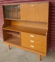 A simulated teak highboard