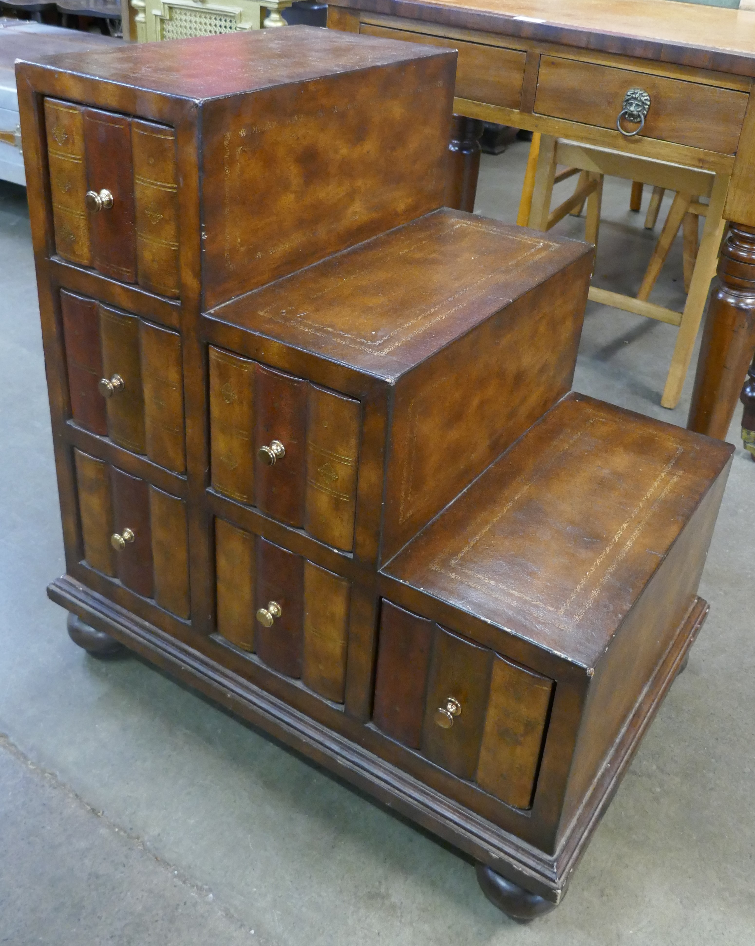 A set of mahogany library steps