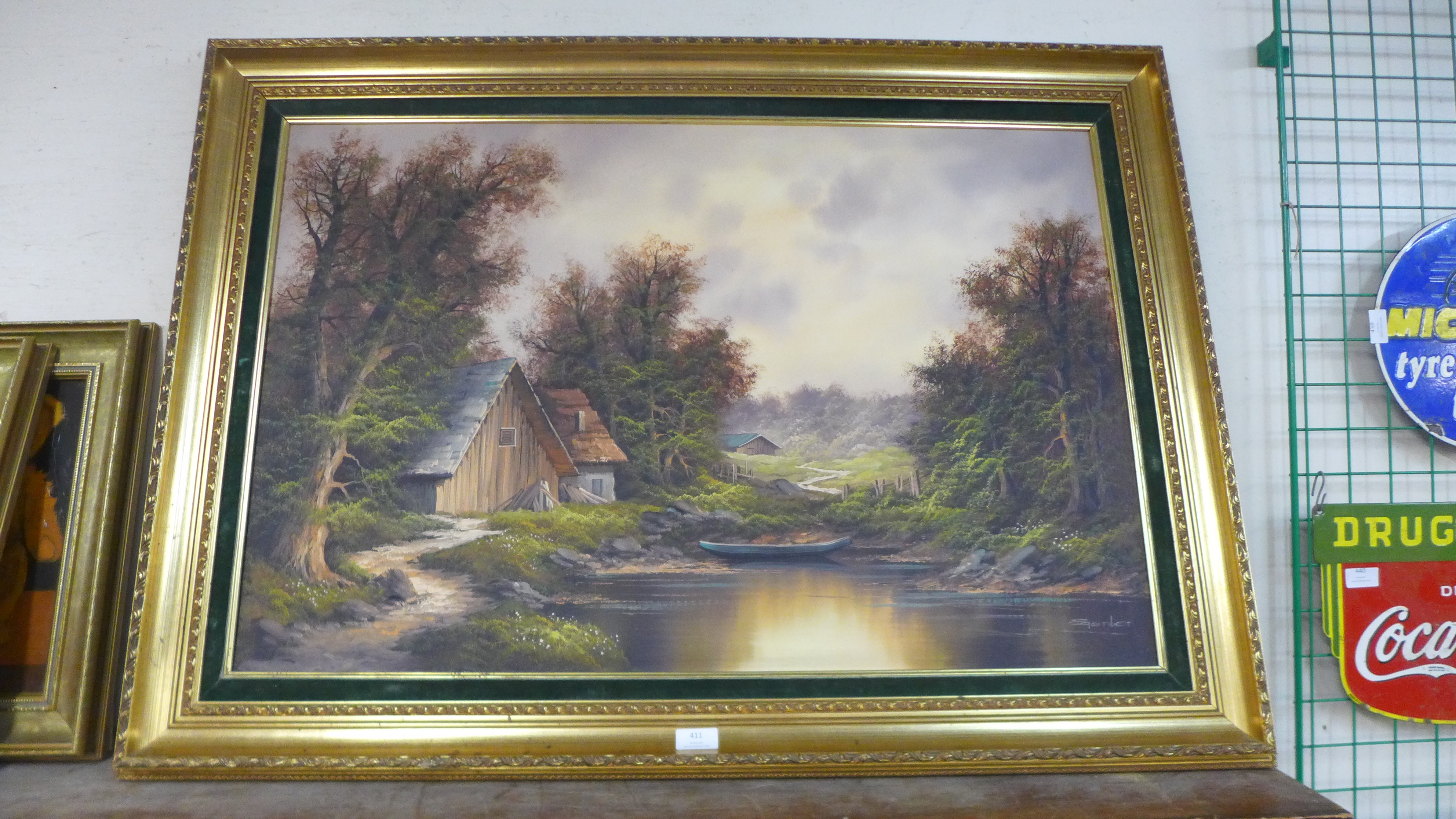 Continental School (20th Century), cabin by a lake, oil on canvas, indistinctly signed, framed - Image 2 of 2