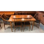 A Younger teak extending dining table and six chairs