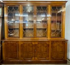 A Regency style yew wood library bookcase