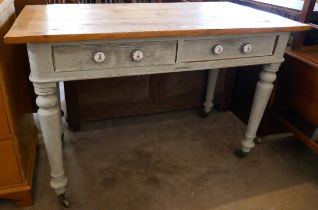A Victorian painted pine two drawer pantry table