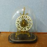 A glass domed gilt metal fusee skeleton clock