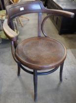 A beech bentwood chair, a carved oak spinning chair and an onyx occasional table