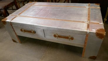 An aviator style riveted aluminium coffee table