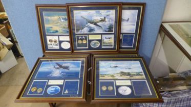 A framed set of Bradford Exchange limited edition prints with gold plated commemorative coins (7),