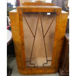 An Art Deco walnut display cabinet