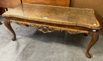 A Queen Anne style carved burr walnut coffee table