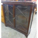 A George III style mahogany display cabinet