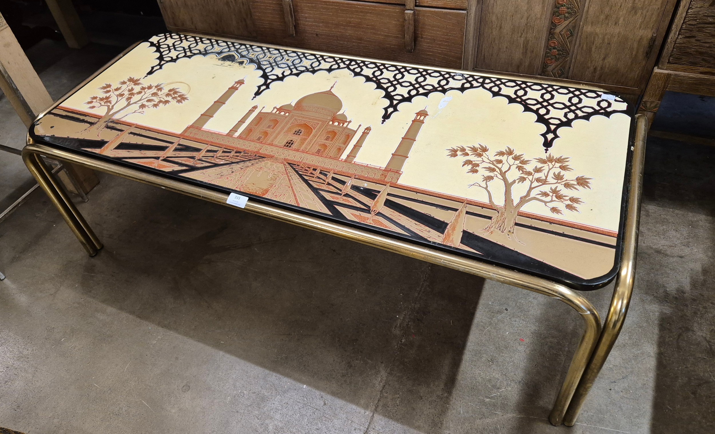 A tubular metal coffee table, with laminated Taj Mahal top - Image 2 of 3