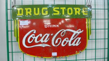 An enamelled Coca-Cola advertising sign