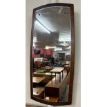 A teak framed mirror