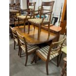 A Regency style mahogany pedestal dining table and six chairs