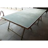 A vintage table tennis table on trestle base