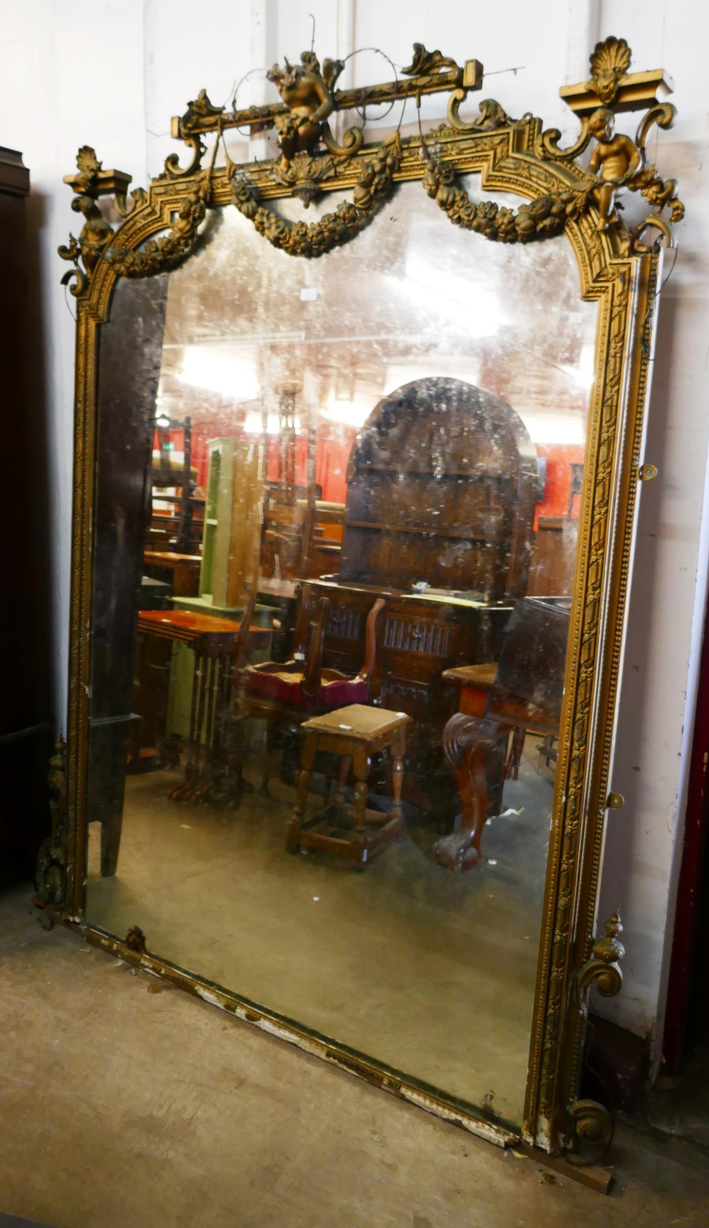 A large Victorian gilt gesso framed mirror