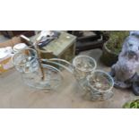 A French style metal tricycle shaped garden planter