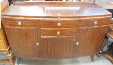 A mahogany bow front sideboard