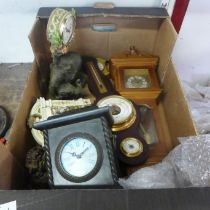 Assorted clocks and a barometer