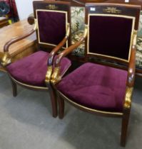 A pair of mahogany Empire stykle armchairs